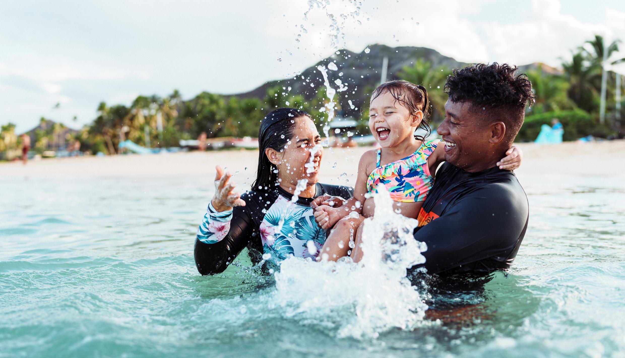 family in ocean