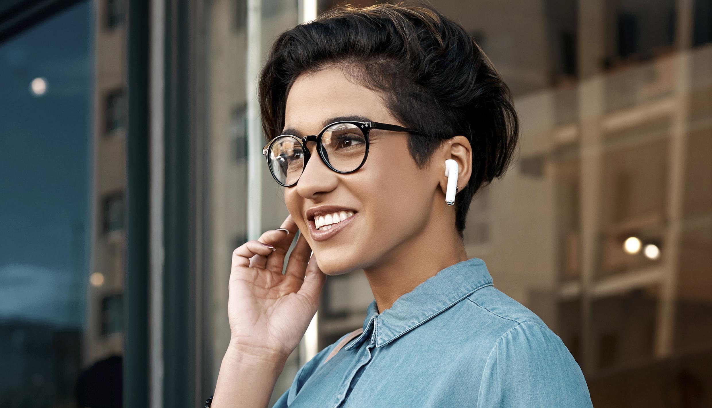 woman listening to earbuds