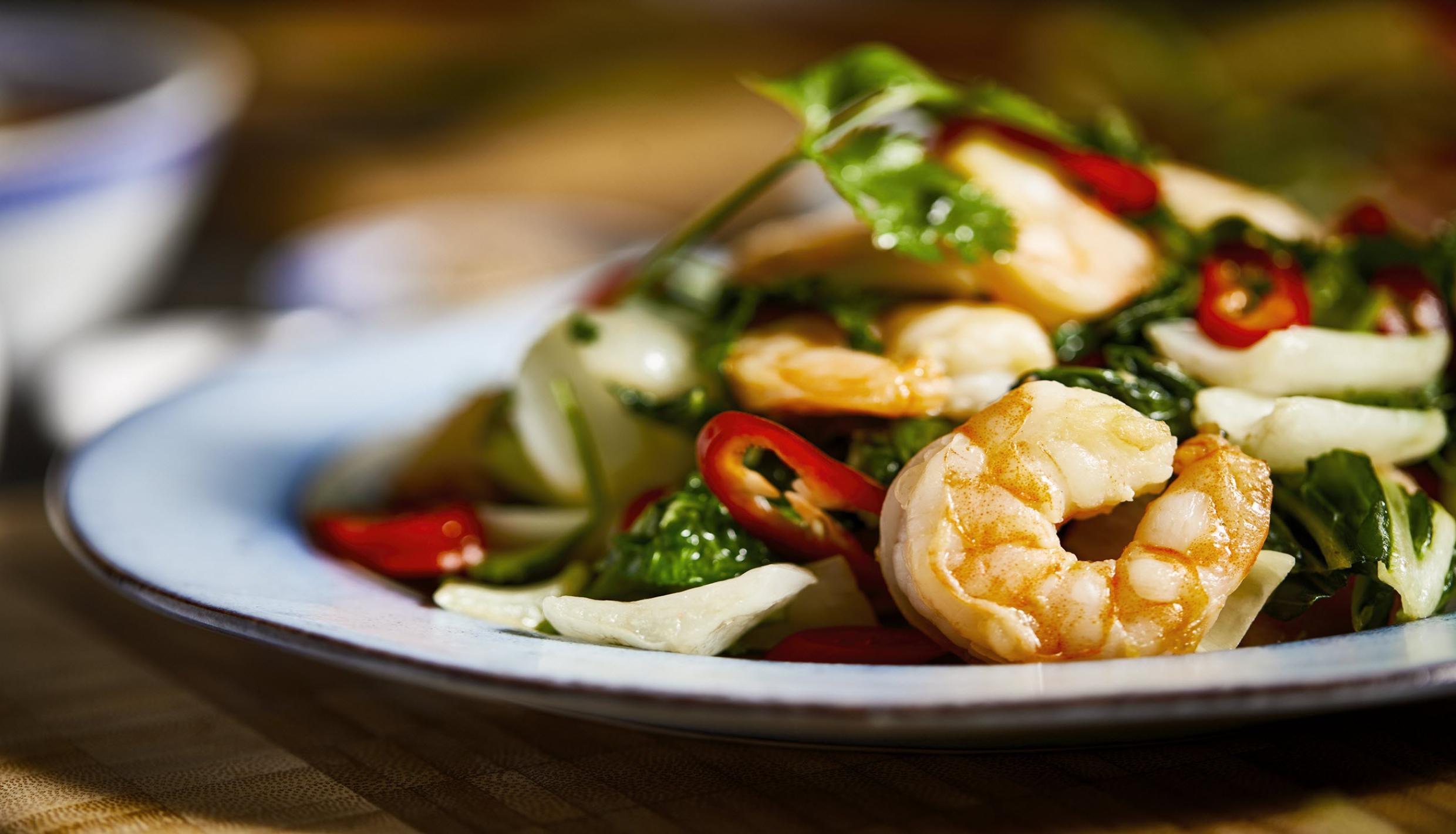 plate of shrimp and greens