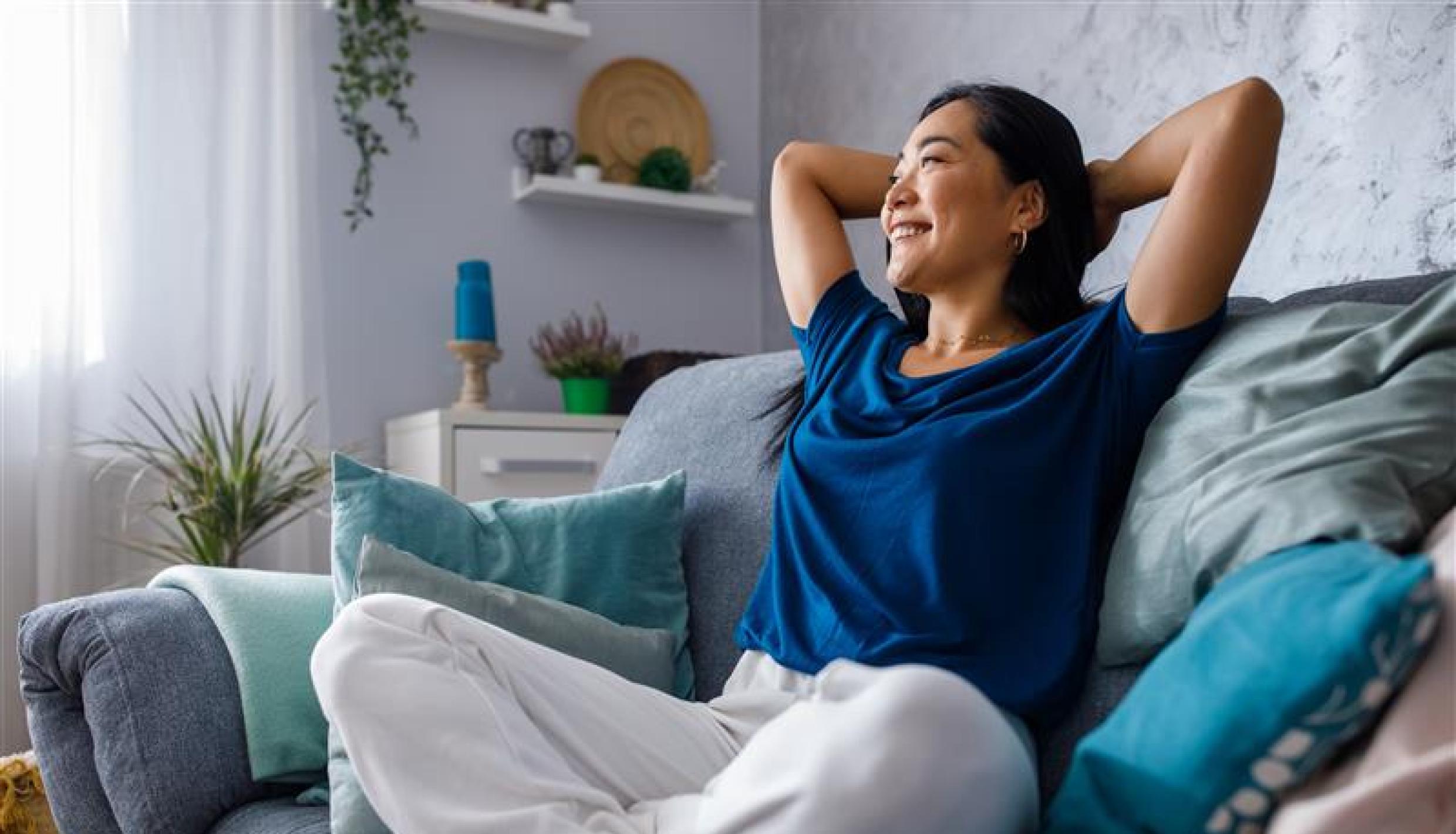 woman sitting in a sofa