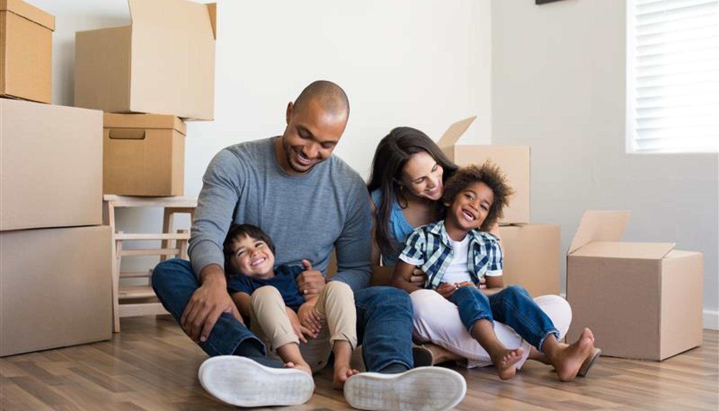 family with moving boxes