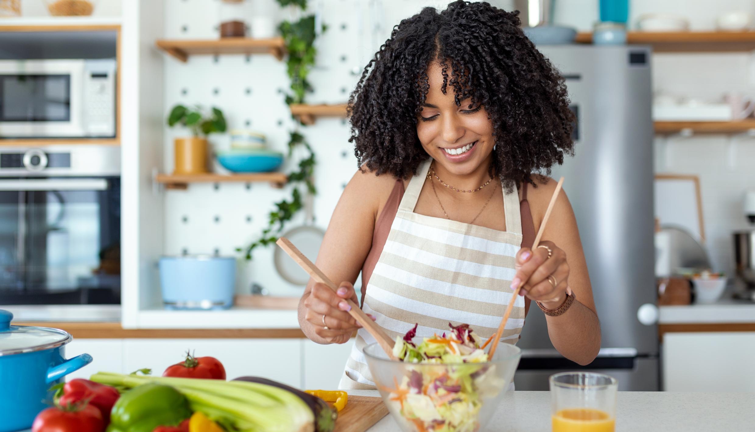 woman cooking a healthy meal