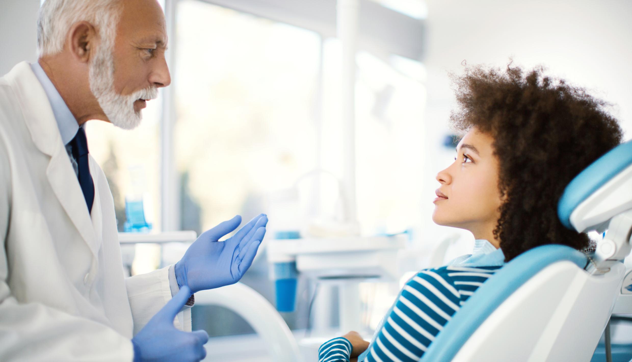 Dentist with patient