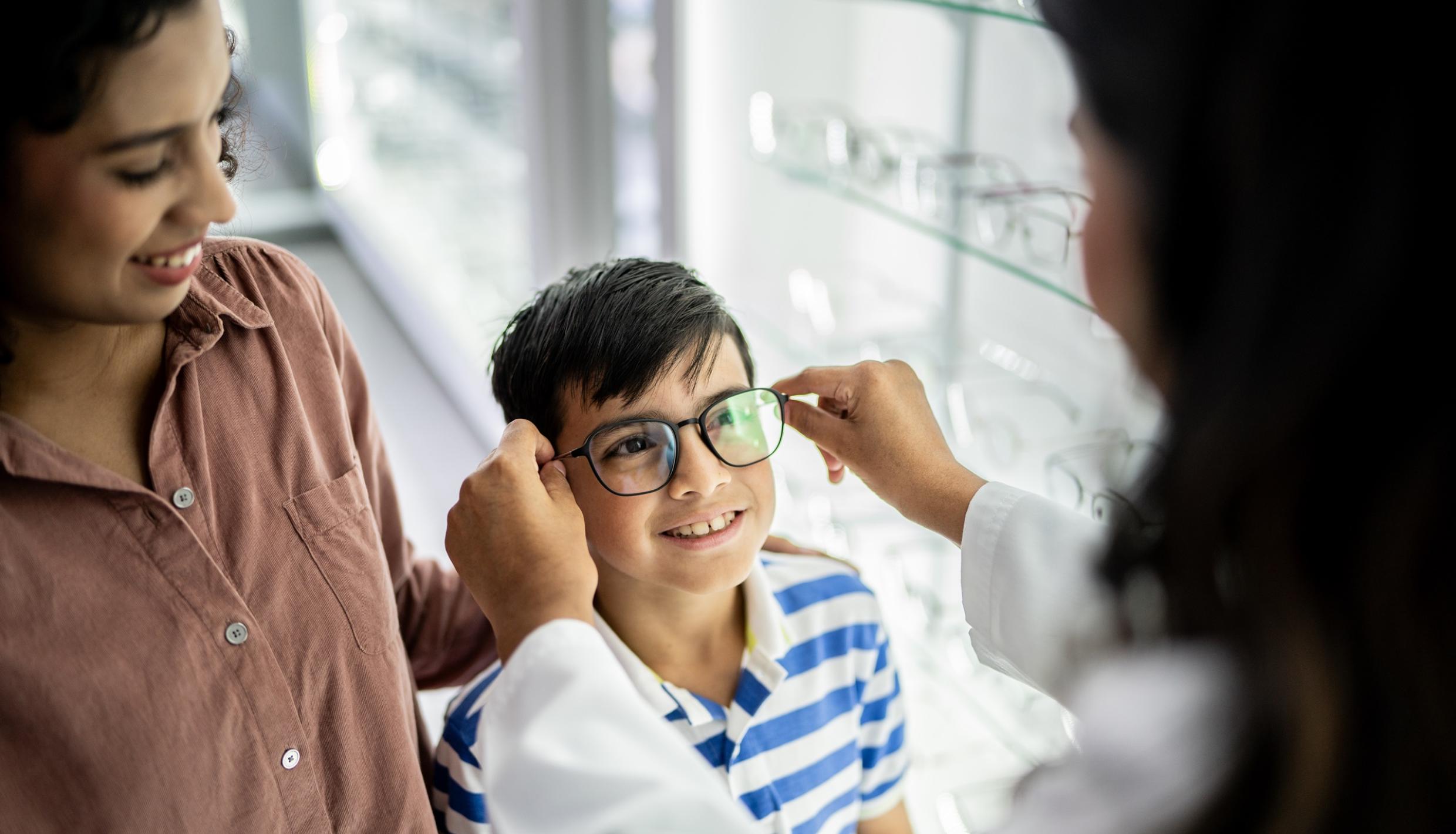 Boy getting glasses