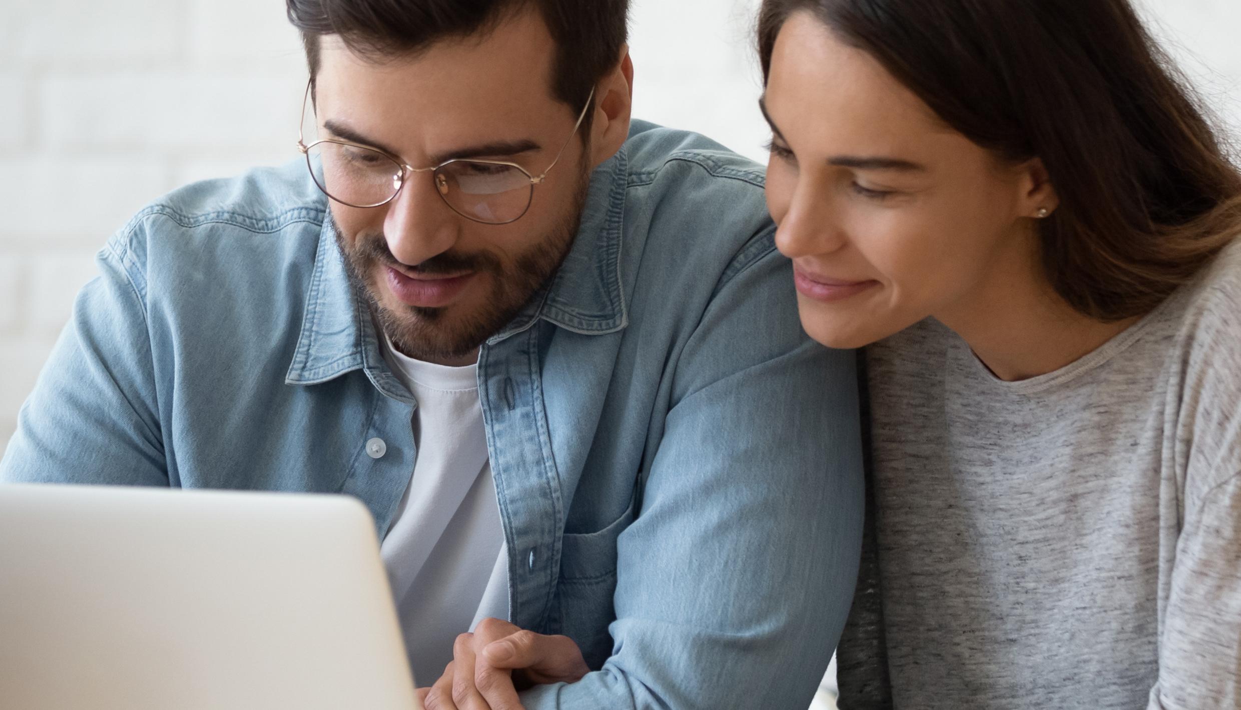 couple looking at a laptop