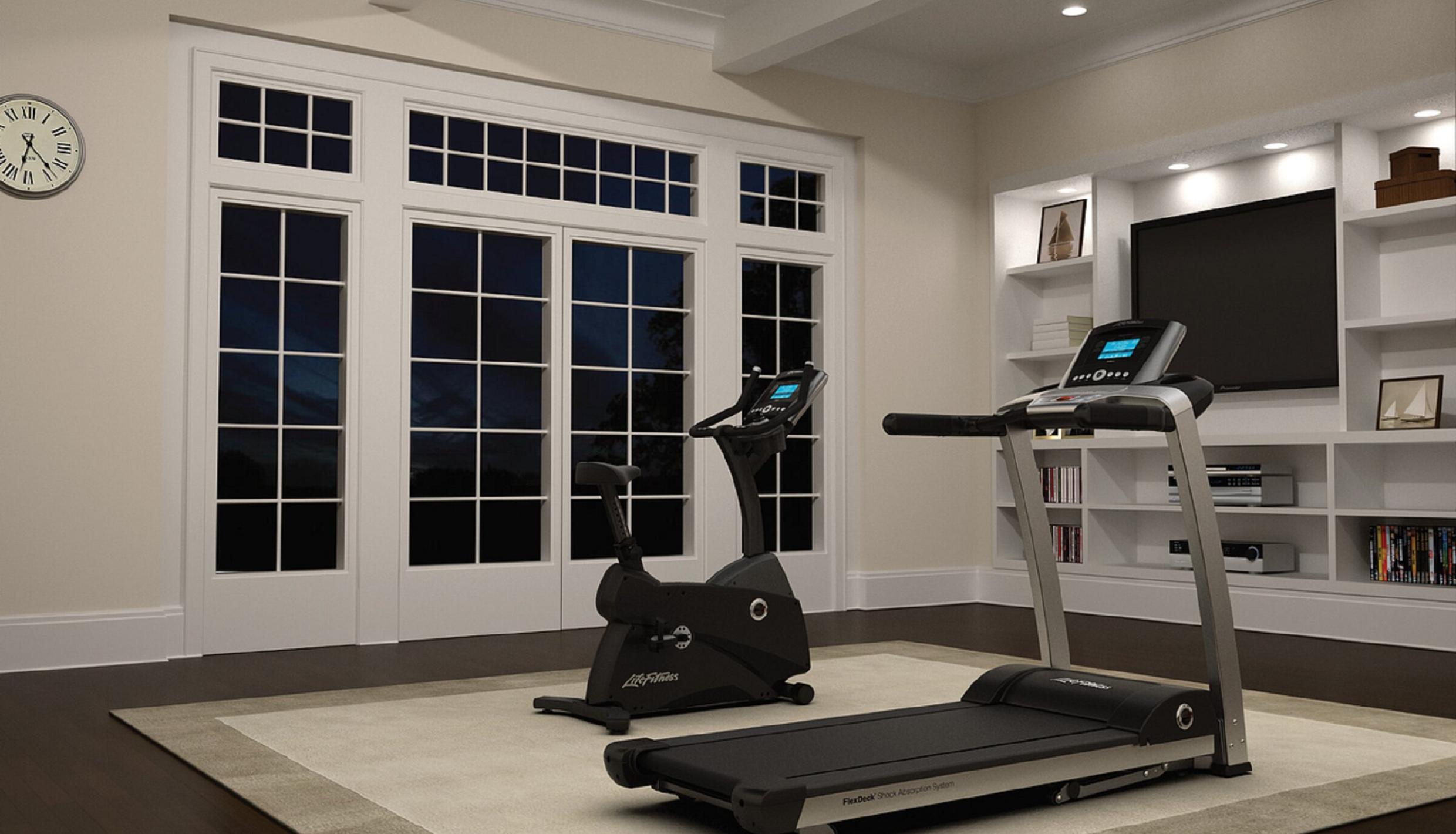 Room with treadmill and bike