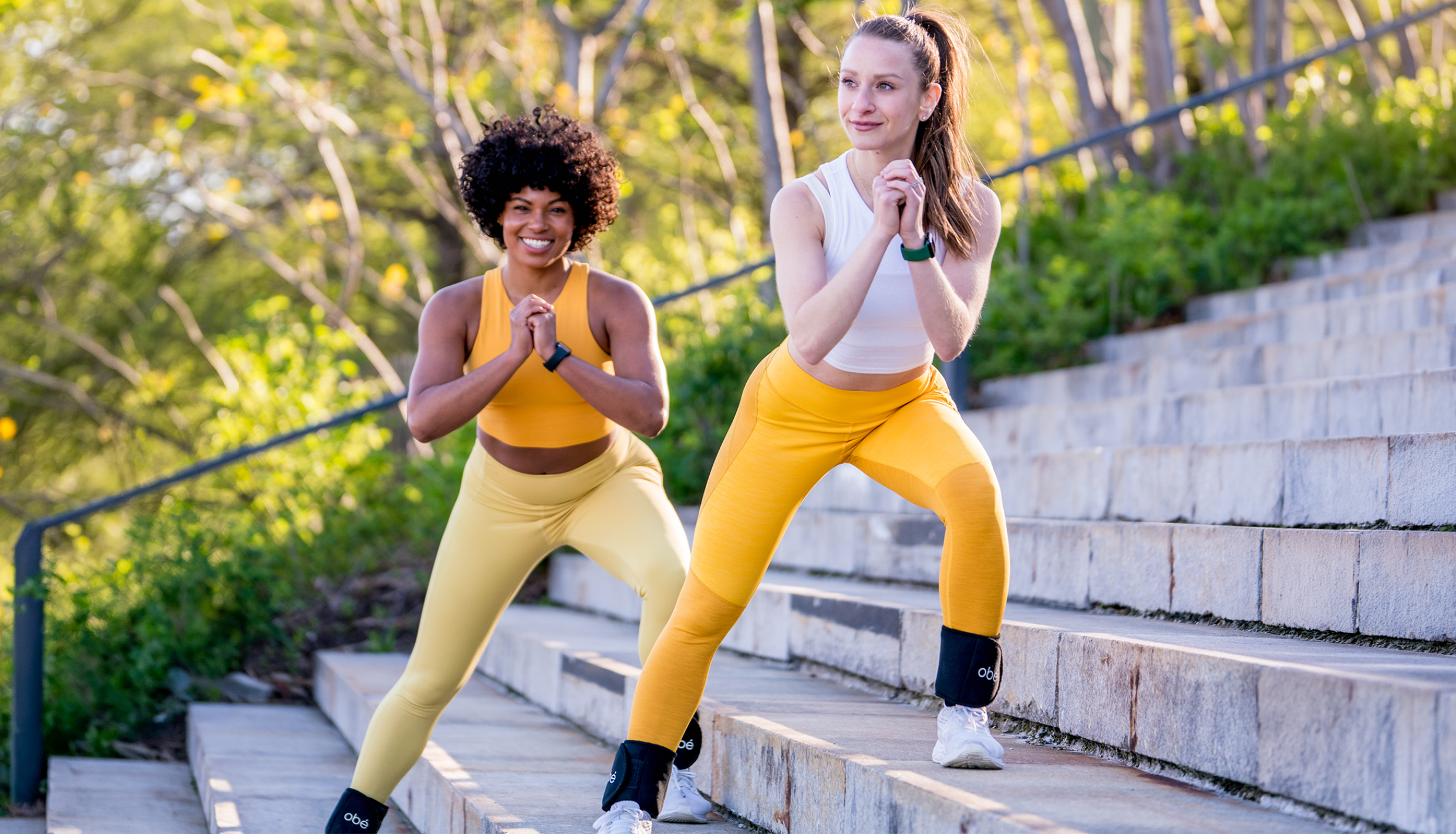 Two women on stairs exercising