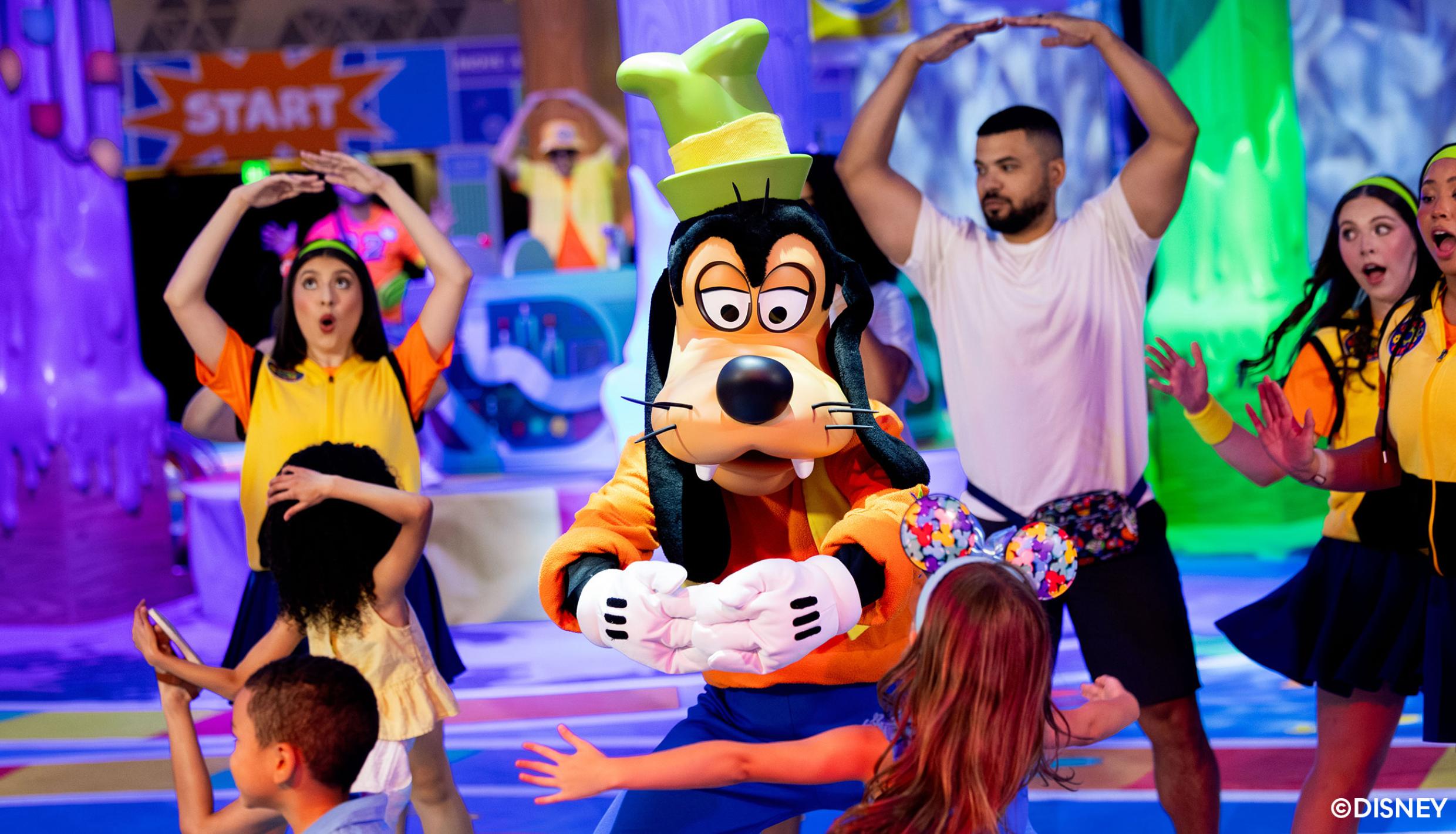 Goofy and people dancing