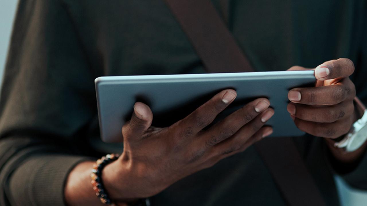 Man hold computer tablet 