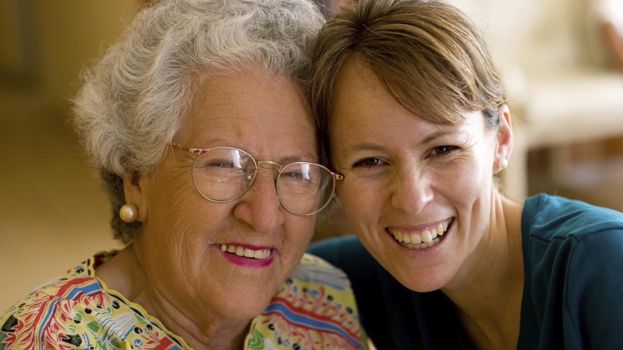 Two women smiling