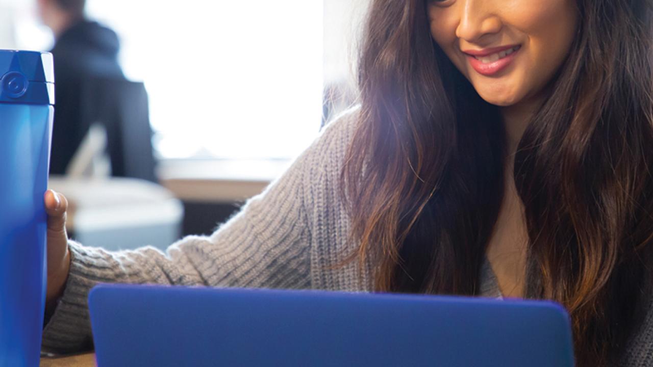 Girl holding water bottle