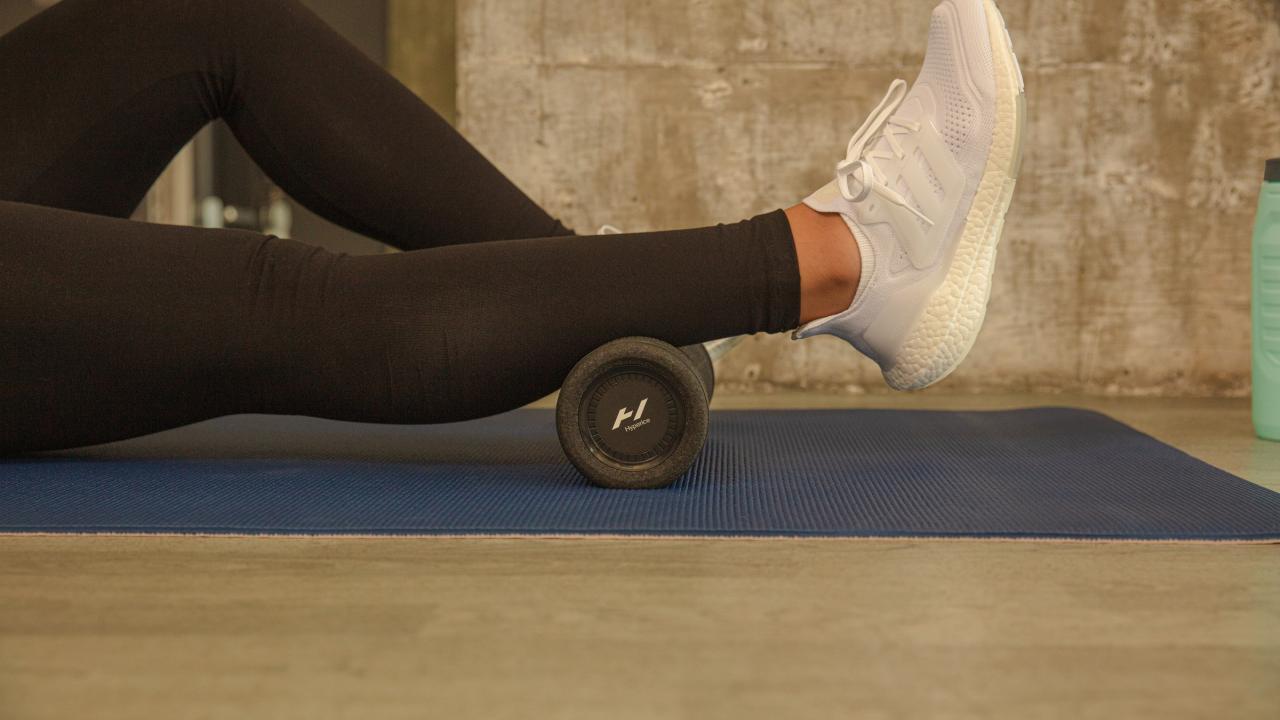 Lady stretching on mat