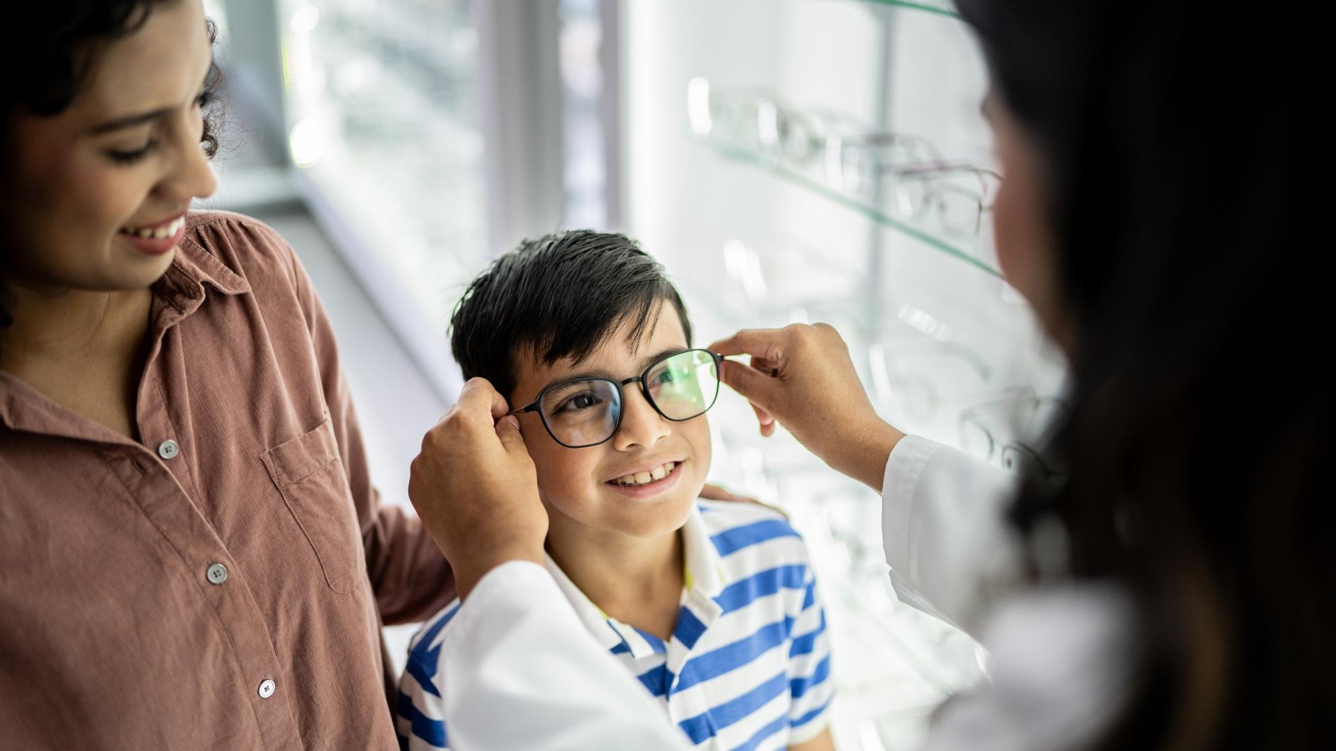 Boy getting glasses