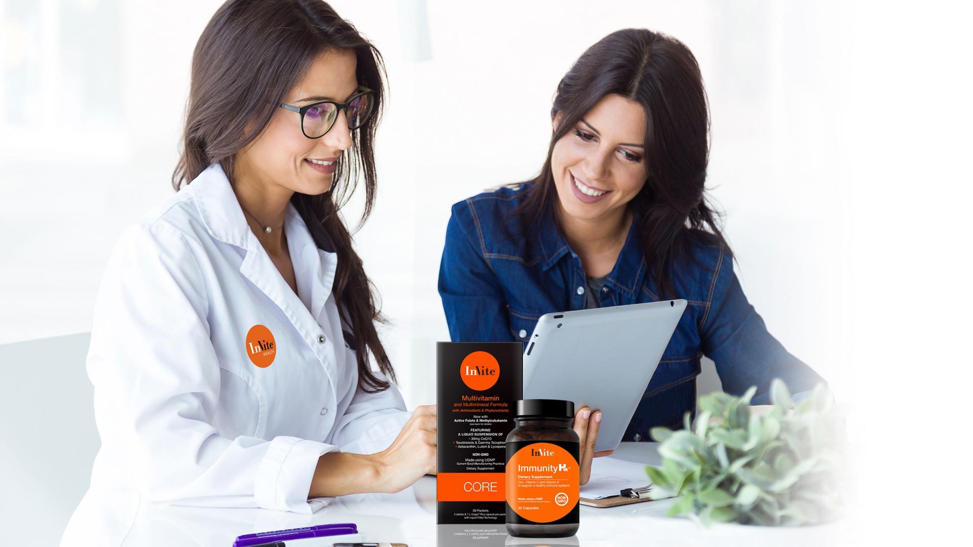 Two woman reviewing a laptop