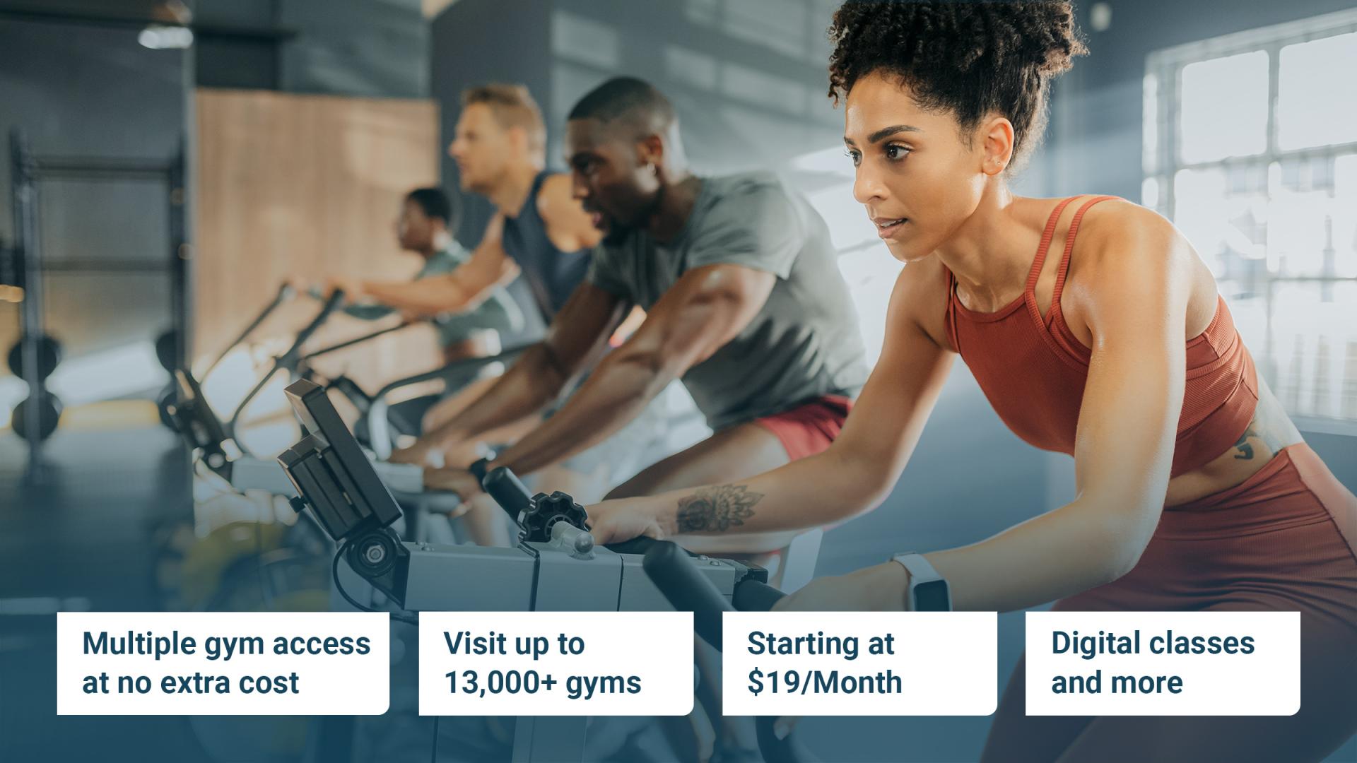 People in the gym on spin bikes