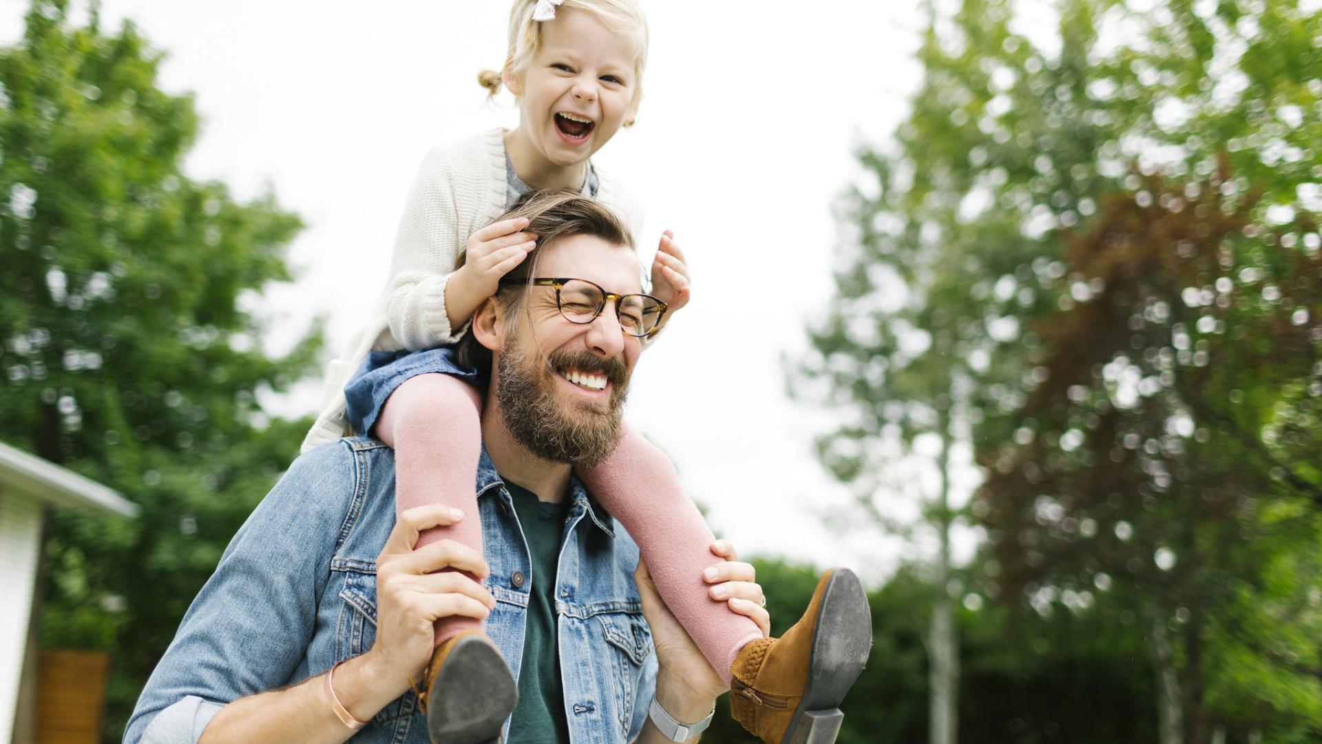 man and girl smiling