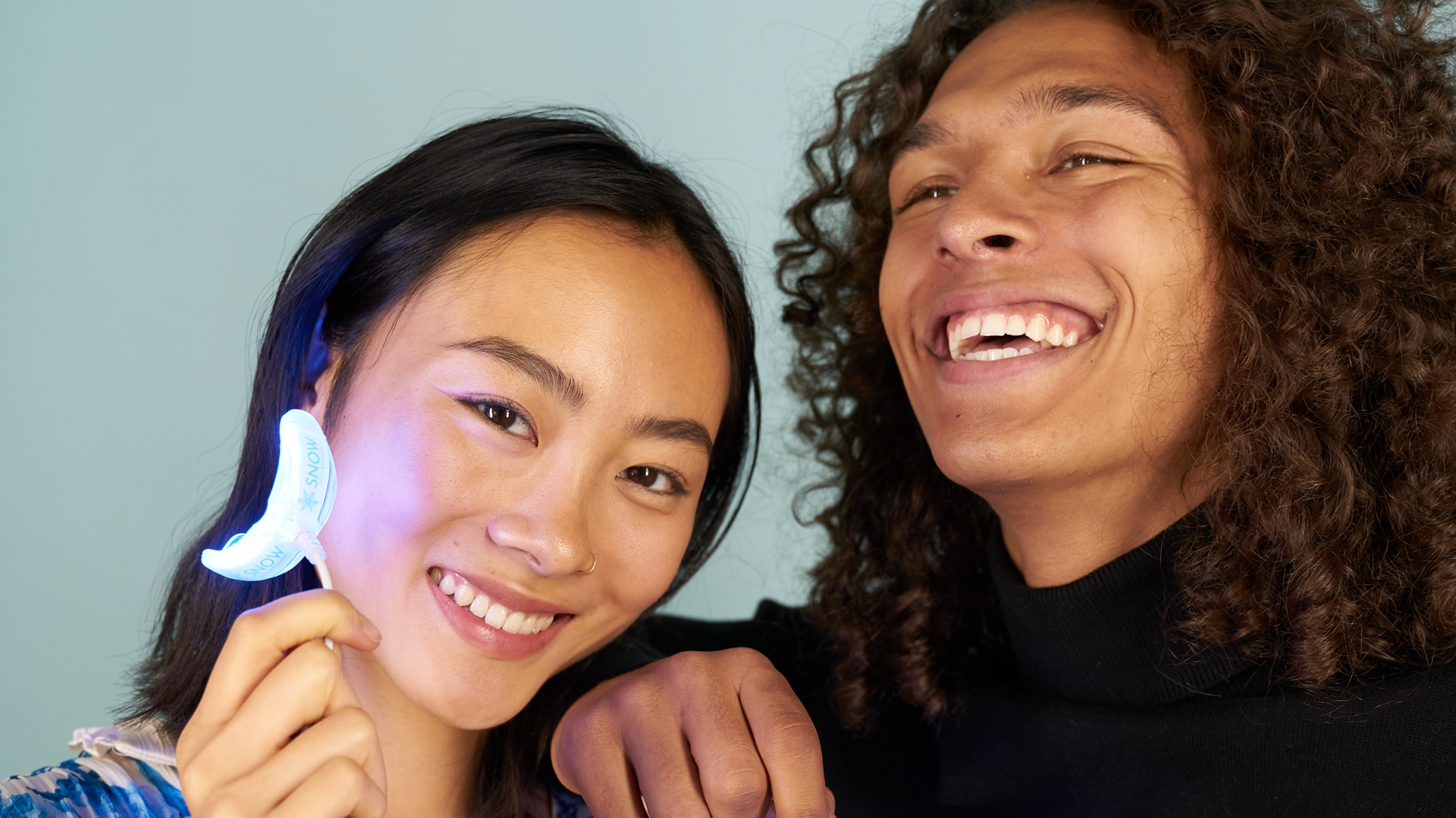 Two women smiling