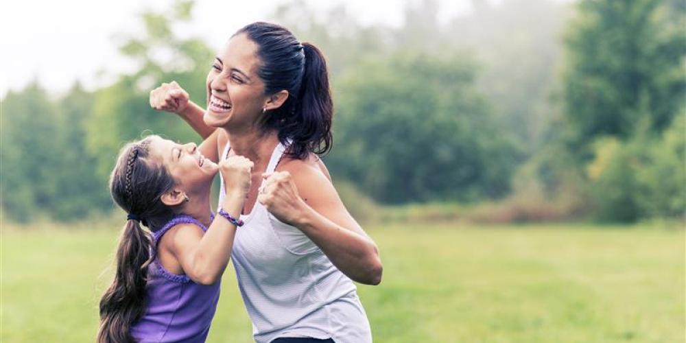 mom and daughter exercising