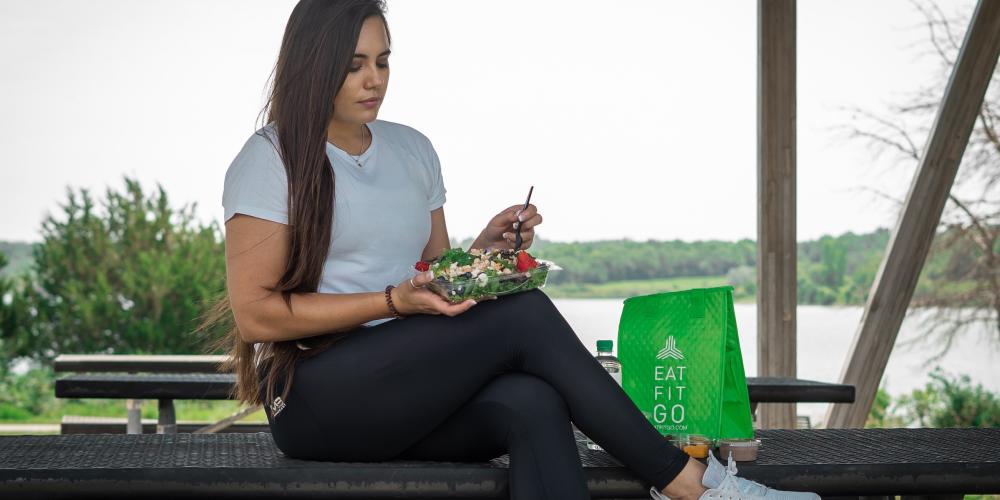 woman eating a salad 