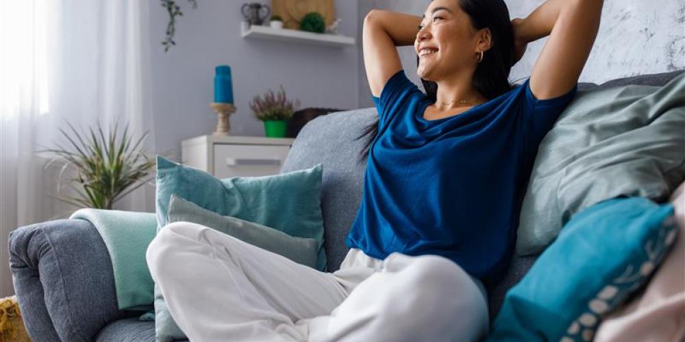 woman sitting in a sofa