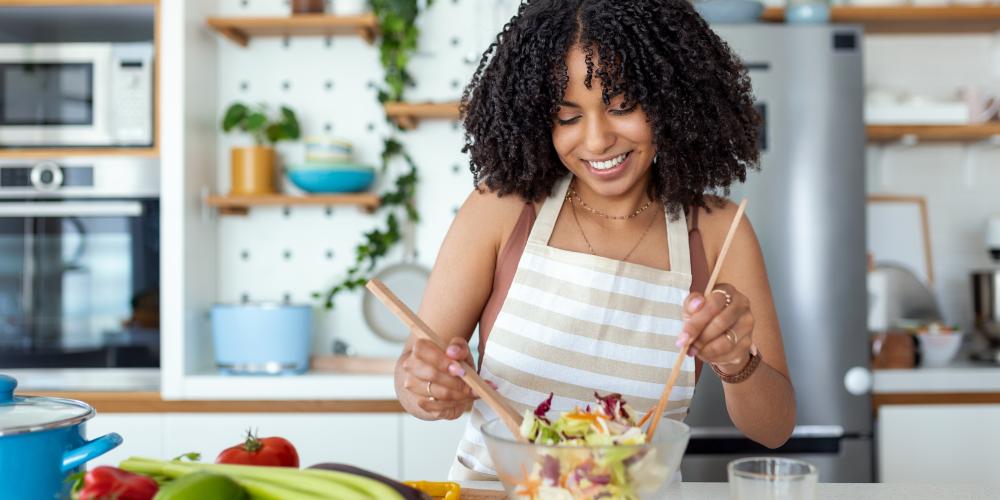 woman cooking a healthy meal