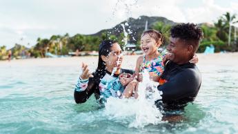 family in ocean