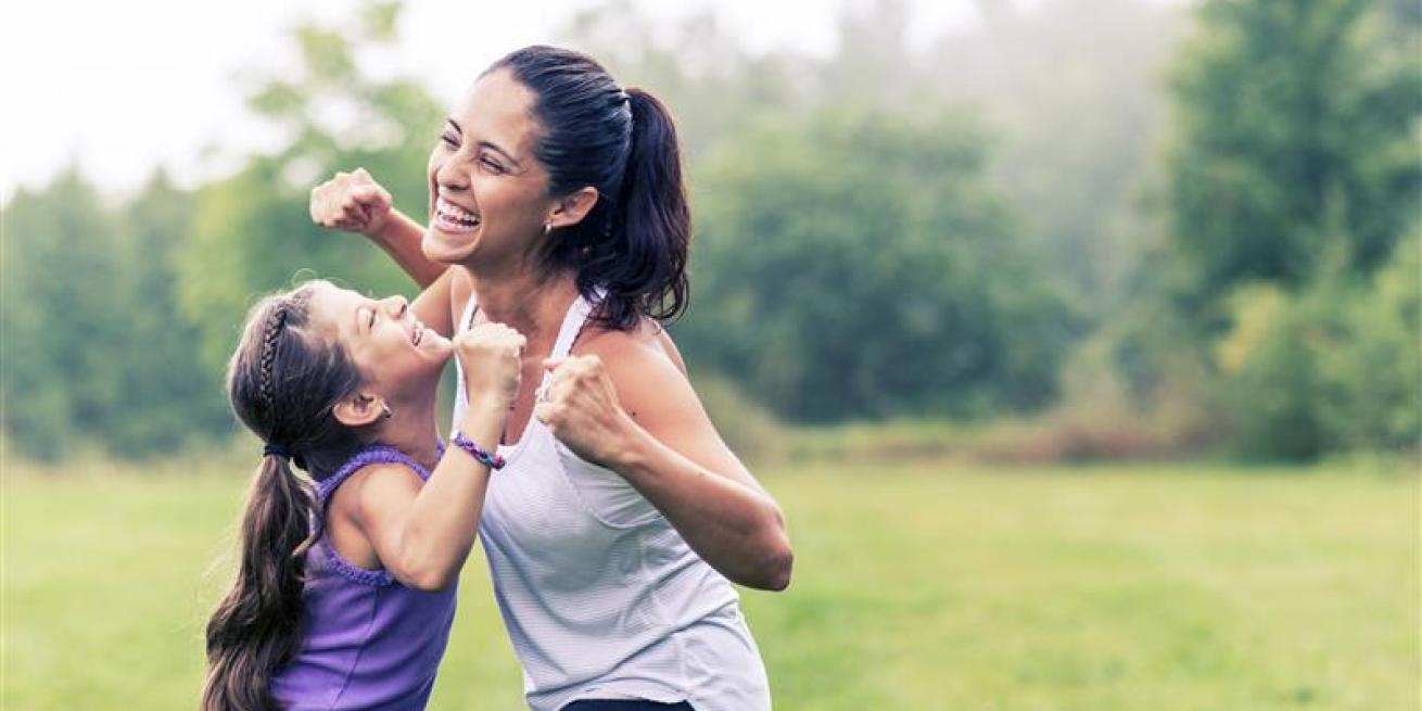mom and daughter exercising