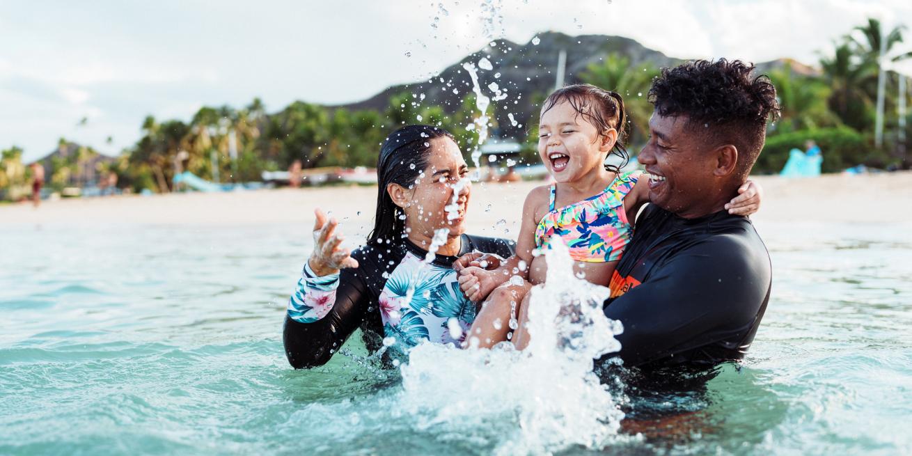 family in ocean