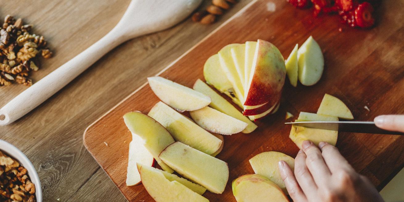 slicing apples with mixed nuts