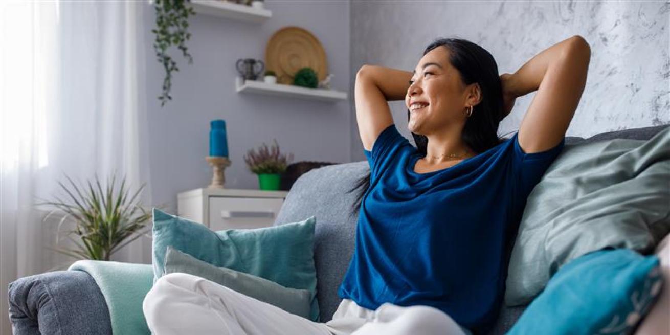 woman sitting in a sofa