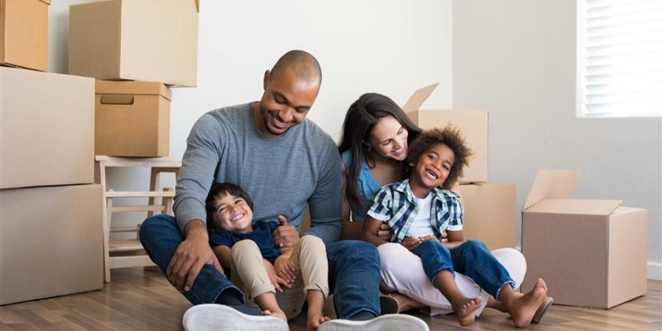 family with moving boxes