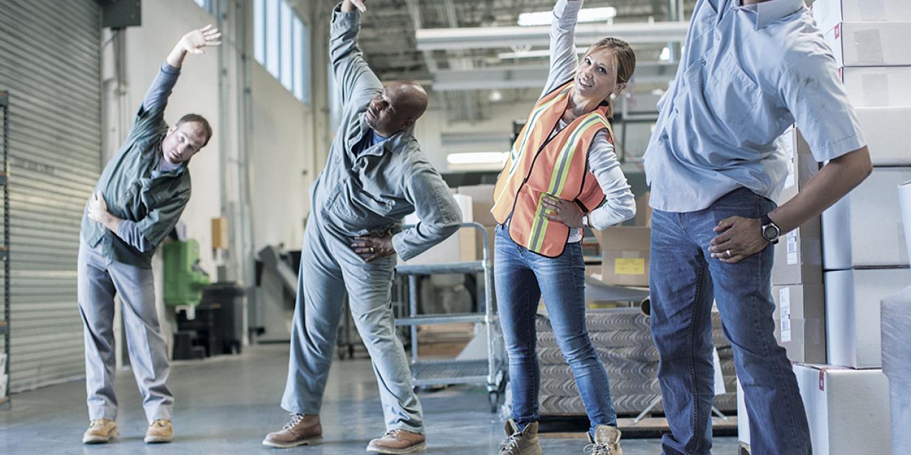 people working out in factory