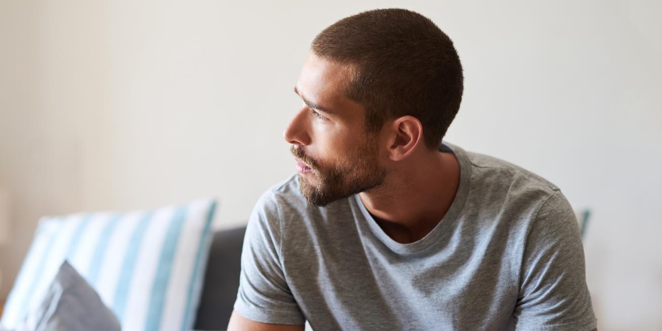 contemplative man looking out to the left