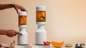 Two white blenders on table
