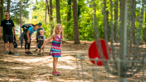 Family Playing Disc Golf 