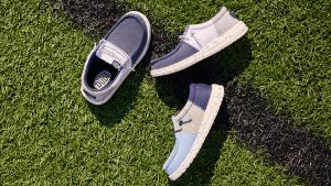 Three shoes on grass