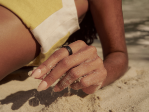 Woman on beach wearing ring