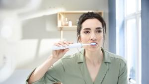 Woman brushing her teeth