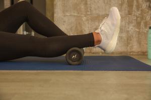 Lady stretching on mat